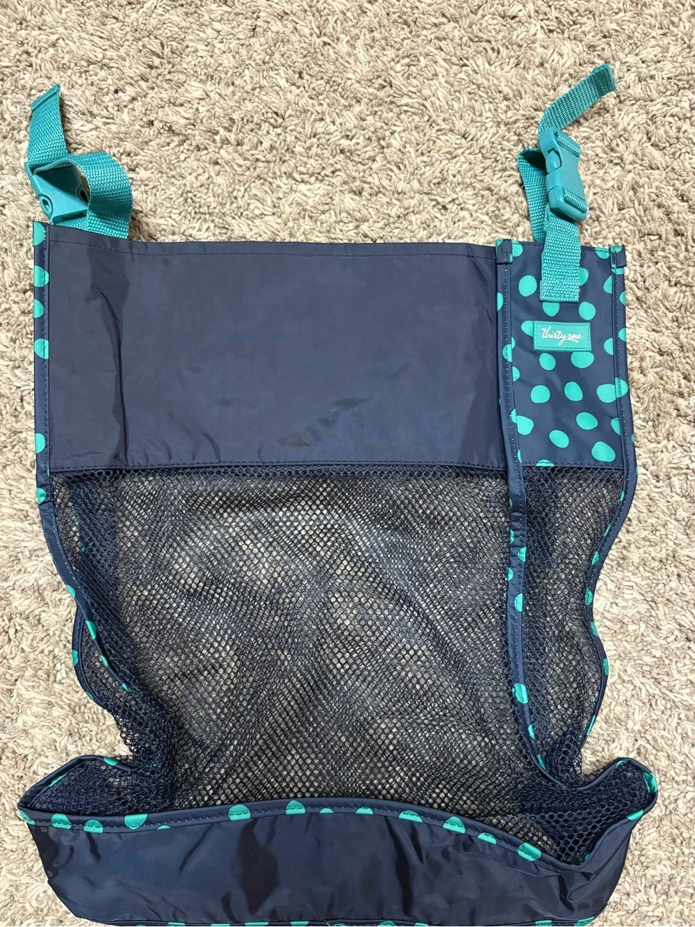thirty-one Teal Polka Dot Mesh Stroller/Car Seat hanging Organizer bag.